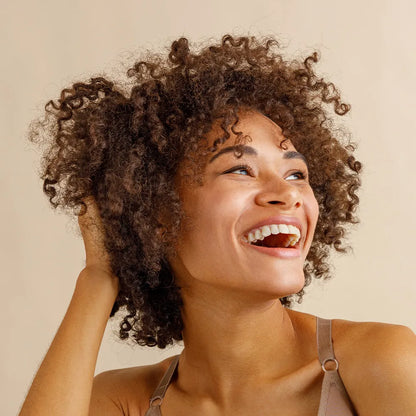 Woman with healthy hair oil