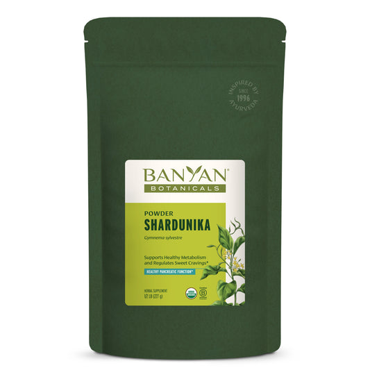 Green pouch of Banyan Botanicals Powder Shardunika on a white background