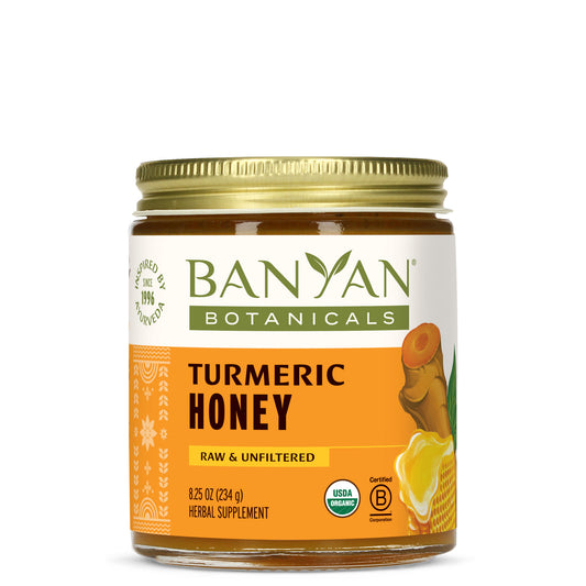 Turmeric Honey jar on white background